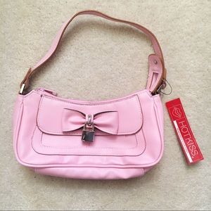 Pink bow and lock purse